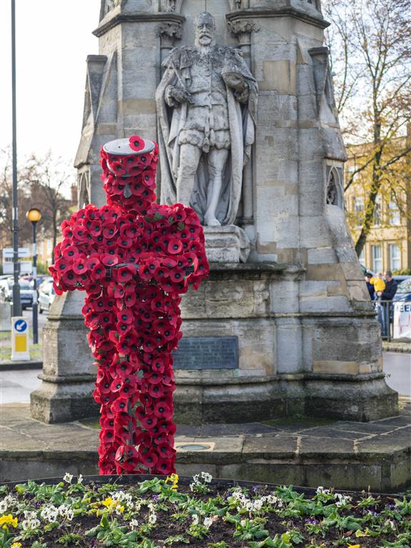 Hundreds show their respects with Banbury’s poppy soldier.